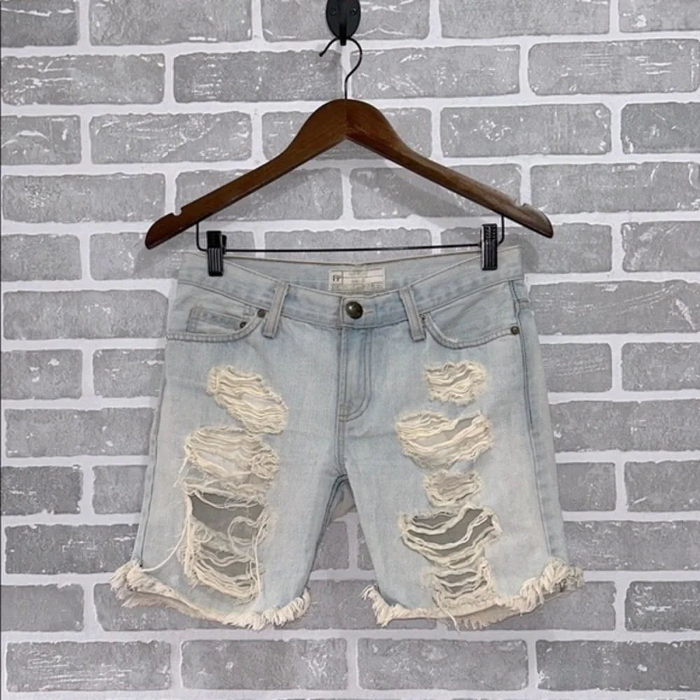 Free People Distressed Bermuda Jean Shorts Light Wash Shredded Raw Hem Size 25